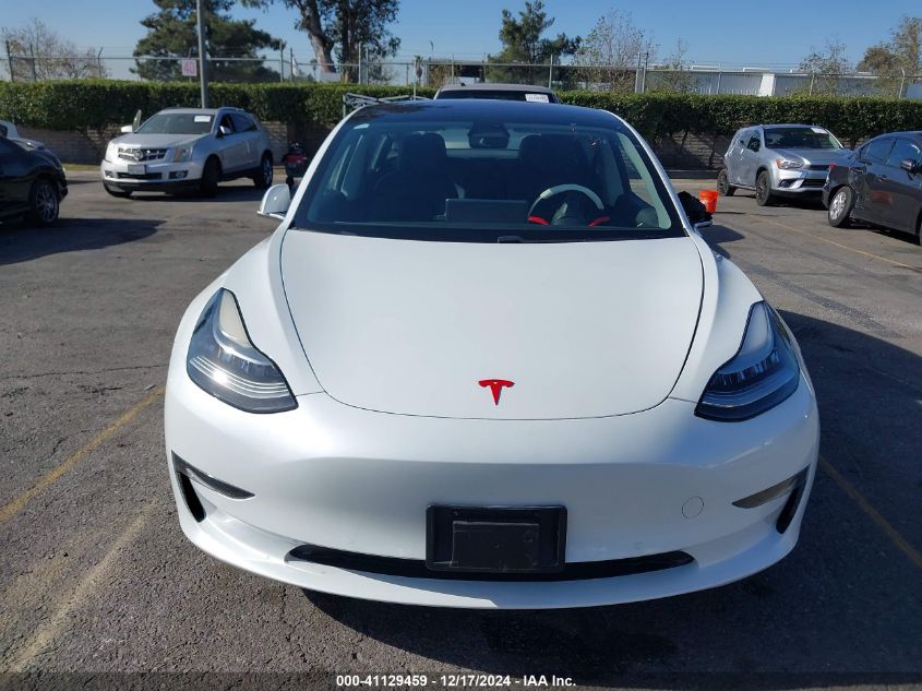 2018 Tesla Model 3 Long Range/Mid Range VIN: 5YJ3E1EA0JF008351 Lot: 41129459