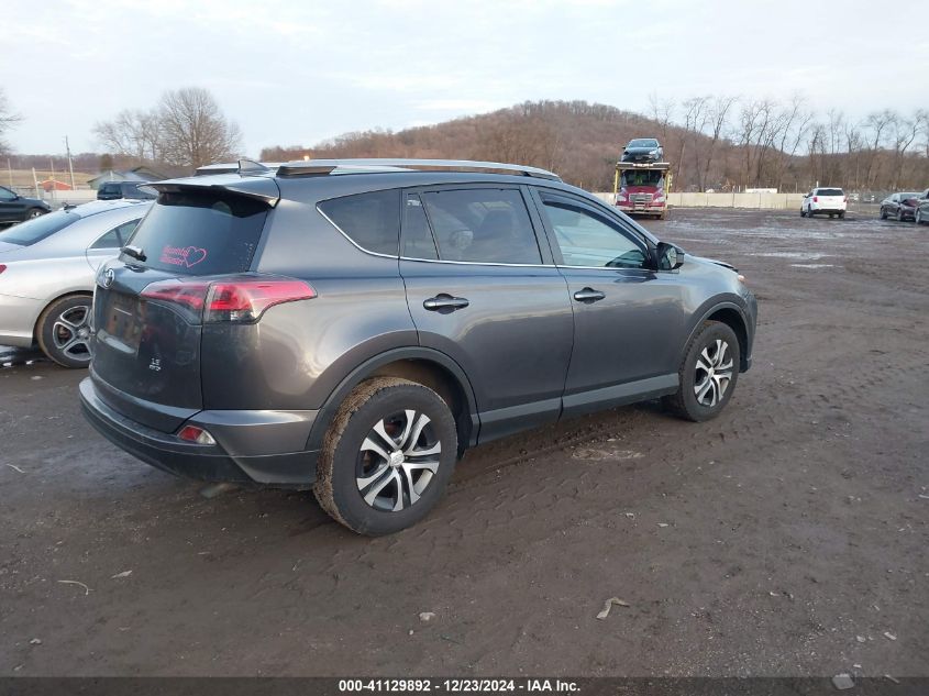 VIN JTMBFREV7HJ106418 2017 Toyota RAV4, LE no.4