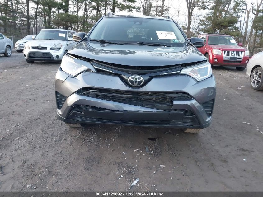 VIN JTMBFREV7HJ106418 2017 Toyota RAV4, LE no.6