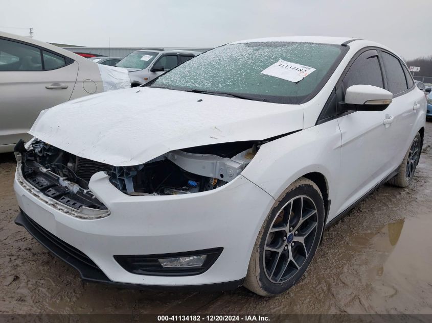 VIN 1FADP3FEXJL216137 2018 Ford Focus, SE no.2