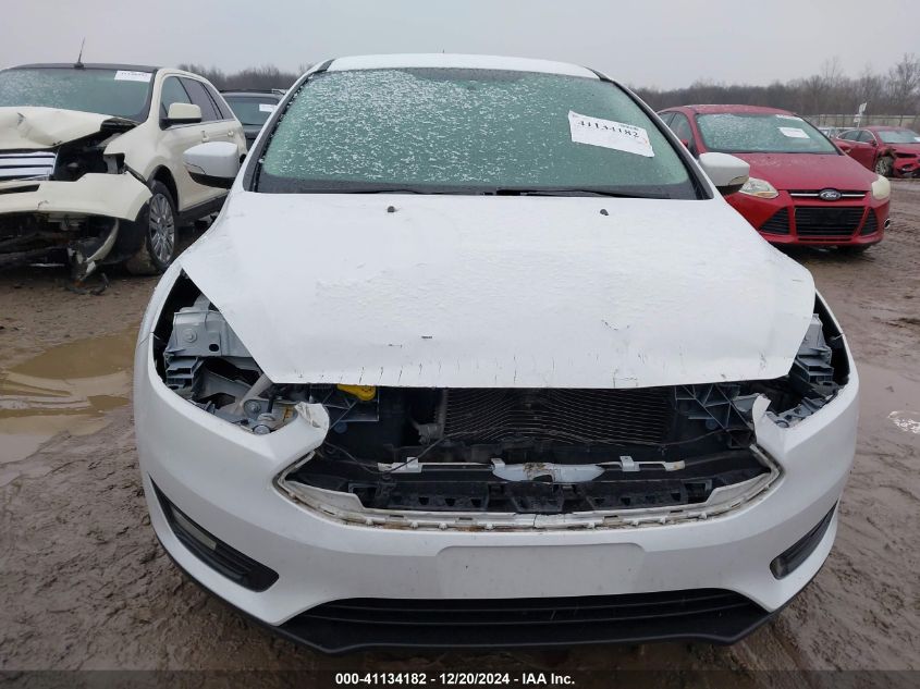 VIN 1FADP3FEXJL216137 2018 Ford Focus, SE no.6