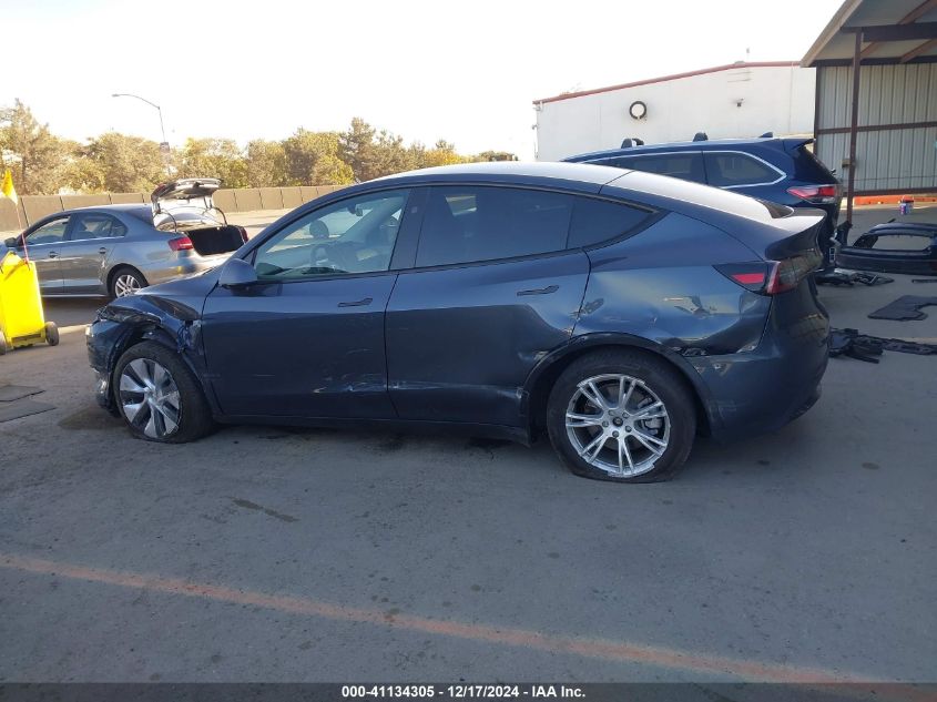 2023 Tesla Model Y Awd/Long Range Dual Motor All-Wheel Drive VIN: 7SAYGDEEXPA146928 Lot: 41134305