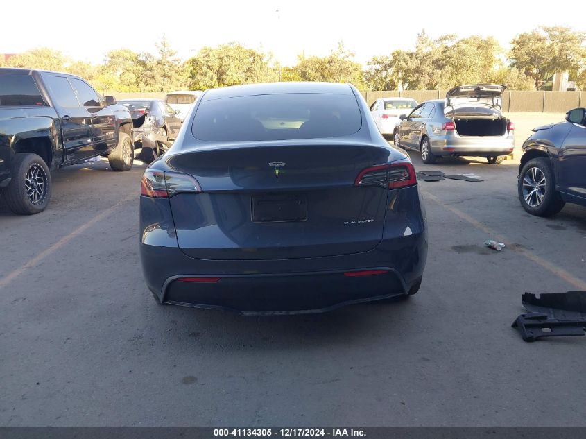 2023 Tesla Model Y Awd/Long Range Dual Motor All-Wheel Drive VIN: 7SAYGDEEXPA146928 Lot: 41134305