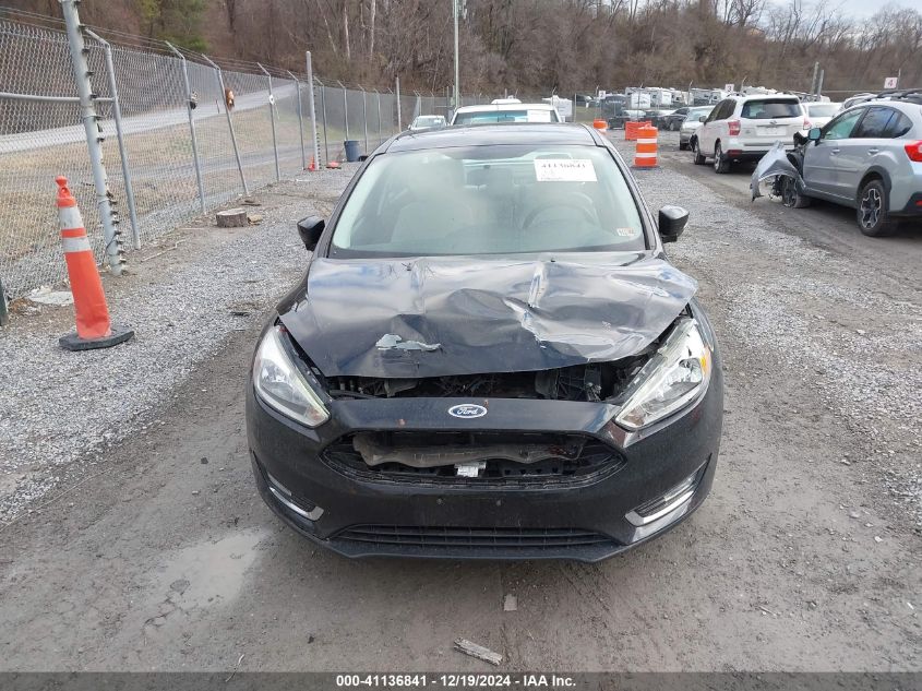 VIN 1FADP3J26FL323111 2015 Ford Focus, Titanium no.12