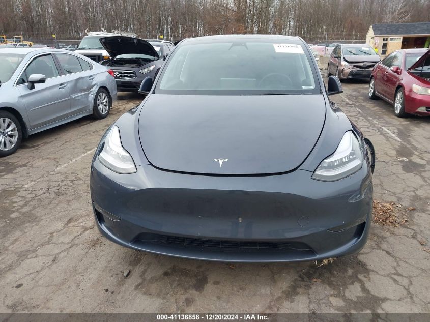 2023 Tesla Model Y Awd/Long Range Dual Motor All-Wheel Drive VIN: 7SAYGDEE8PA057777 Lot: 41136858