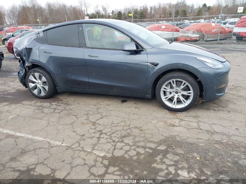 2023 Tesla Model Y Awd/Long Range Dual Motor All-Wheel Drive VIN: 7SAYGDEE8PA057777 Lot: 41136858