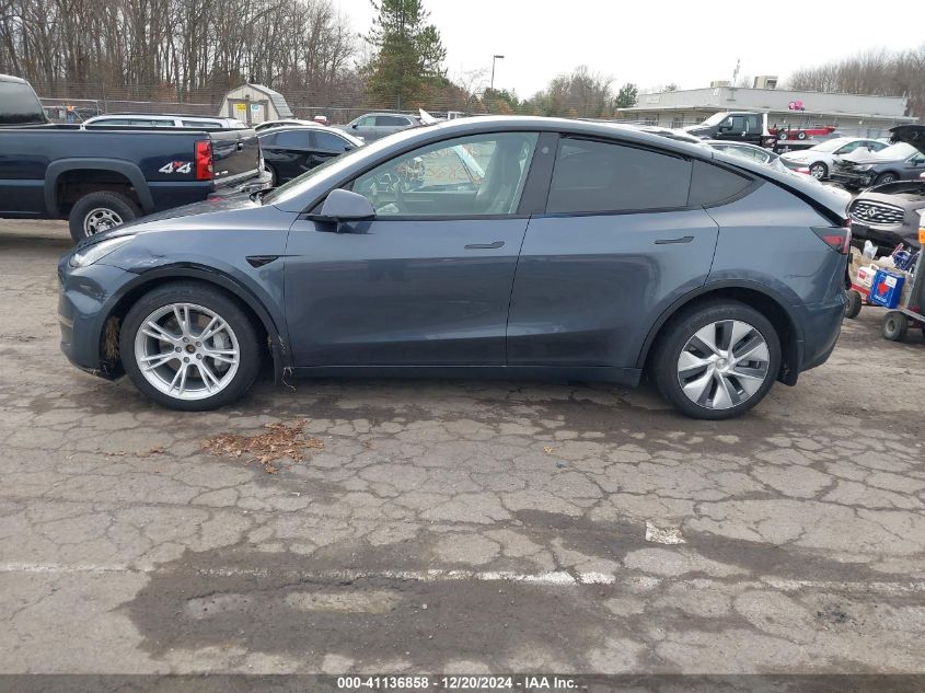 2023 Tesla Model Y Awd/Long Range Dual Motor All-Wheel Drive VIN: 7SAYGDEE8PA057777 Lot: 41136858