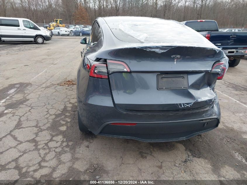 2023 Tesla Model Y Awd/Long Range Dual Motor All-Wheel Drive VIN: 7SAYGDEE8PA057777 Lot: 41136858