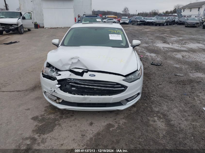 VIN 3FA6P0LU4JR197475 2018 Ford Fusion, Hybrid SE no.12