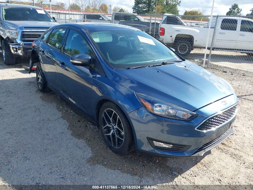 VIN 1FADP3H23JL214765 2018 Ford Focus, Sel no.1