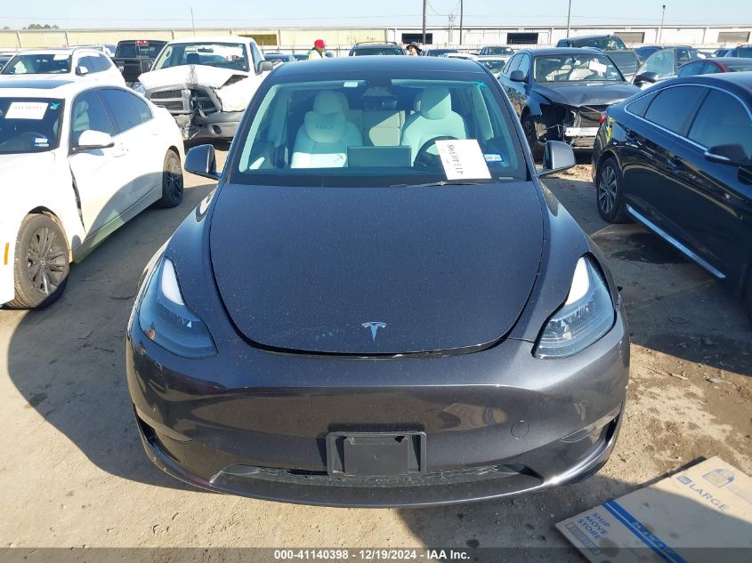 2024 Tesla Model Y Long Range Dual Motor All-Wheel Drive VIN: 7SAYGDEE0RA310092 Lot: 41140398