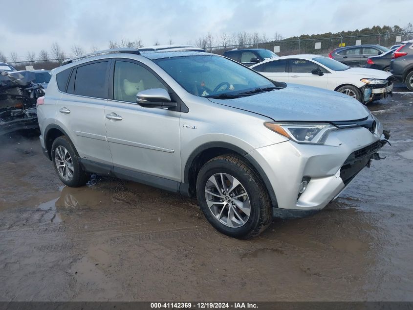 VIN JTMRJREV6GD039868 2016 Toyota RAV4, Hybrid Xle no.1