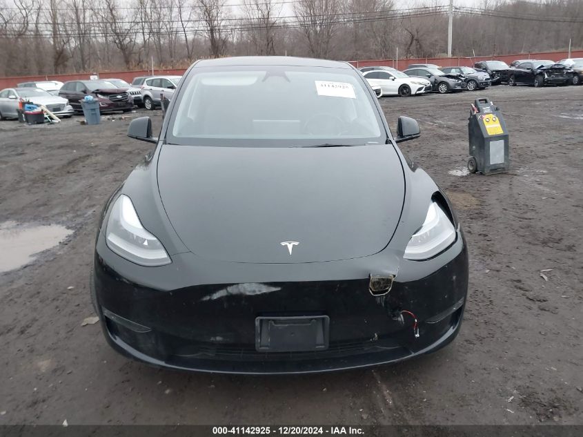 2023 Tesla Model Y Awd/Long Range Dual Motor All-Wheel Drive VIN: 7SAYGDEE8PA183671 Lot: 41142925