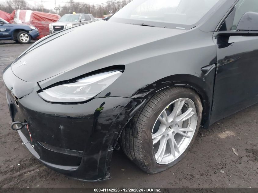 2023 Tesla Model Y Awd/Long Range Dual Motor All-Wheel Drive VIN: 7SAYGDEE8PA183671 Lot: 41142925