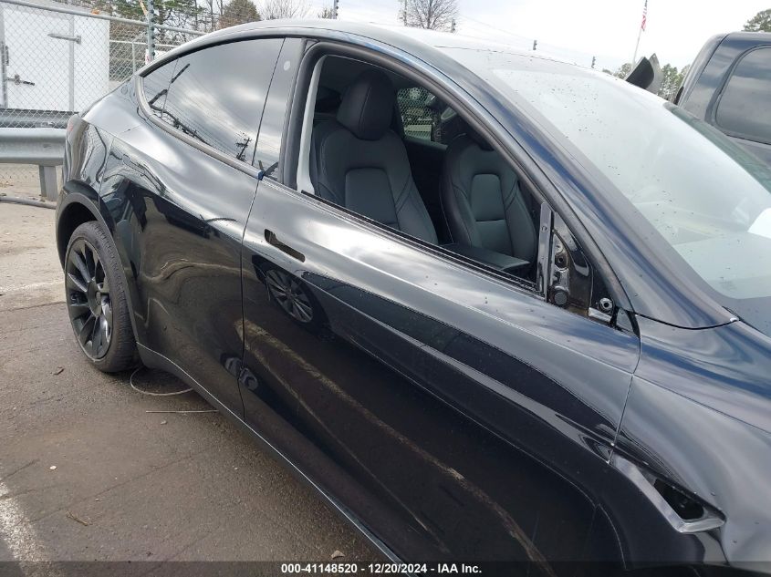 2023 Tesla Model Y Awd/Long Range Dual Motor All-Wheel Drive VIN: 7SAYGDEE0PA098842 Lot: 41148520