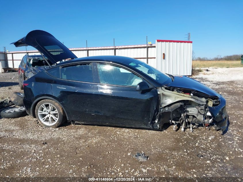 2023 Tesla Model Y Awd/Long Range Dual Motor All-Wheel Drive VIN: 7SAYGDEE2PF707352 Lot: 41148604