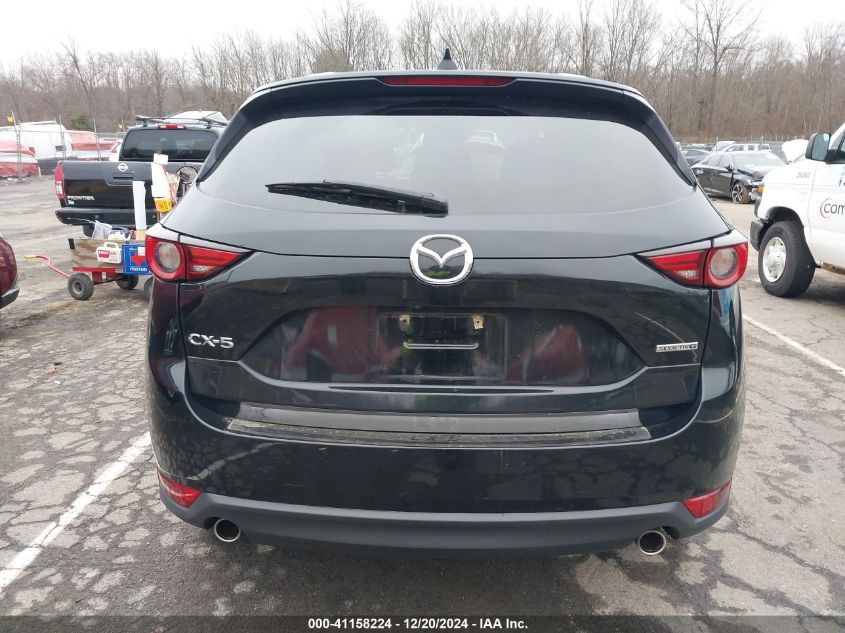 2021 Mazda Cx-5 Grand Touring VIN: JM3KFADM1M1318954 Lot: 41158224