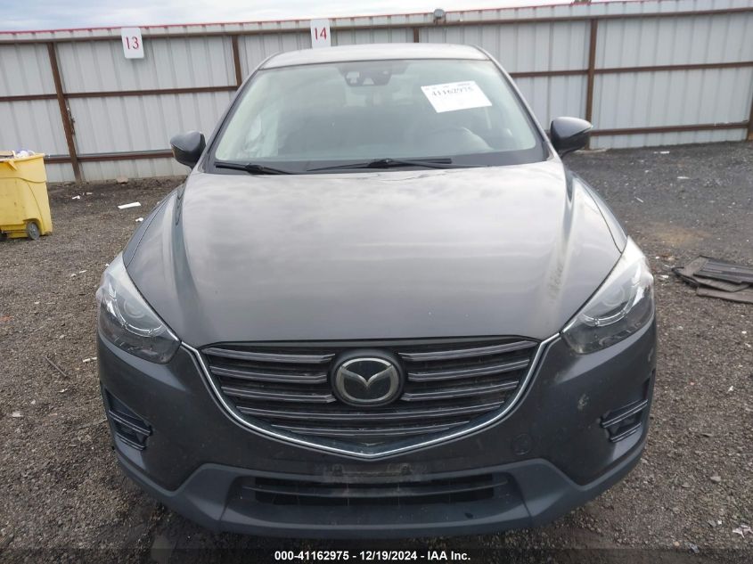 2016 Mazda Cx-5 Grand Touring VIN: JM3KE4DY1G0706963 Lot: 41162975