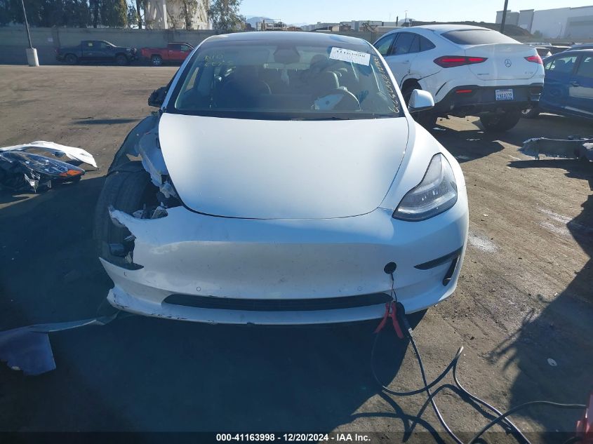 2022 Tesla Model 3 Long Range Dual Motor All-Wheel Drive VIN: 5YJ3E1EB6NF297833 Lot: 41163998