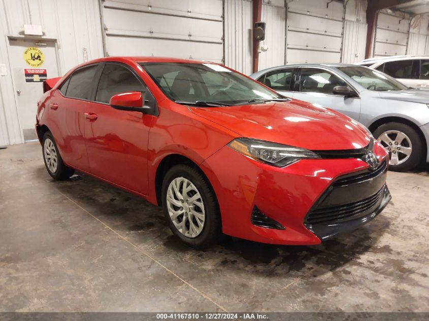 VIN 5YFBURHE4JP826973 2018 Toyota Corolla, LE no.1