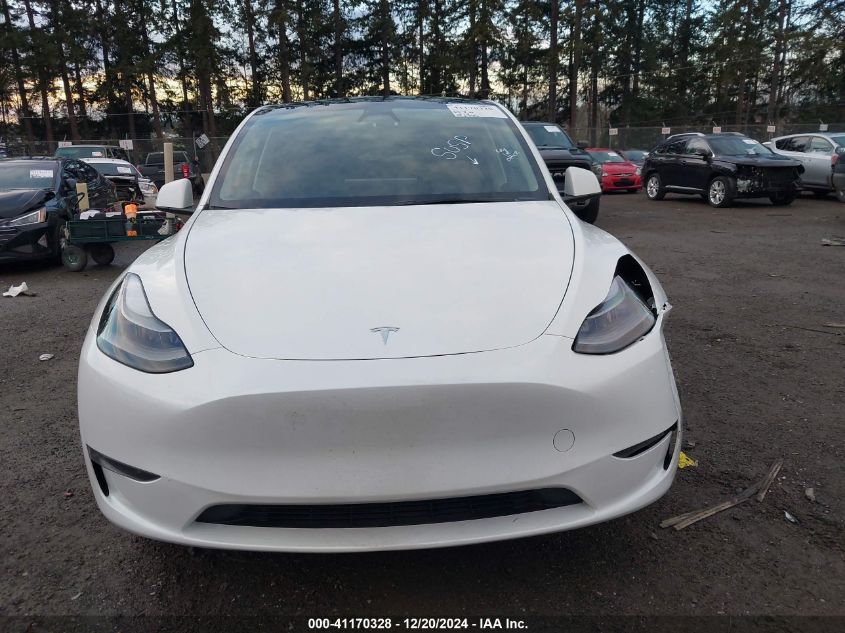 2023 Tesla Model Y Awd/Long Range Dual Motor All-Wheel Drive VIN: 7SAYGDEE1PF910832 Lot: 41170328