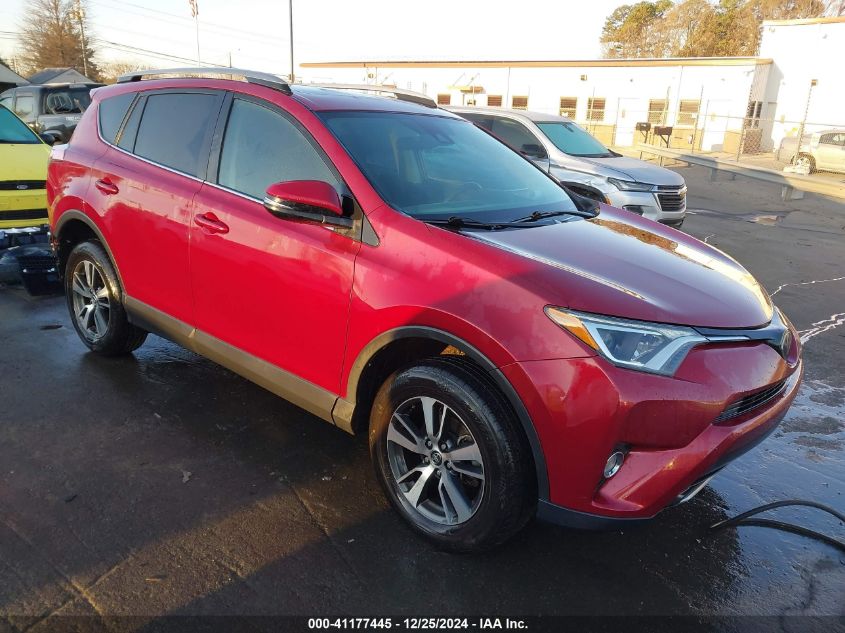 VIN 2T3WFREV3JW411780 2018 TOYOTA RAV4 no.1