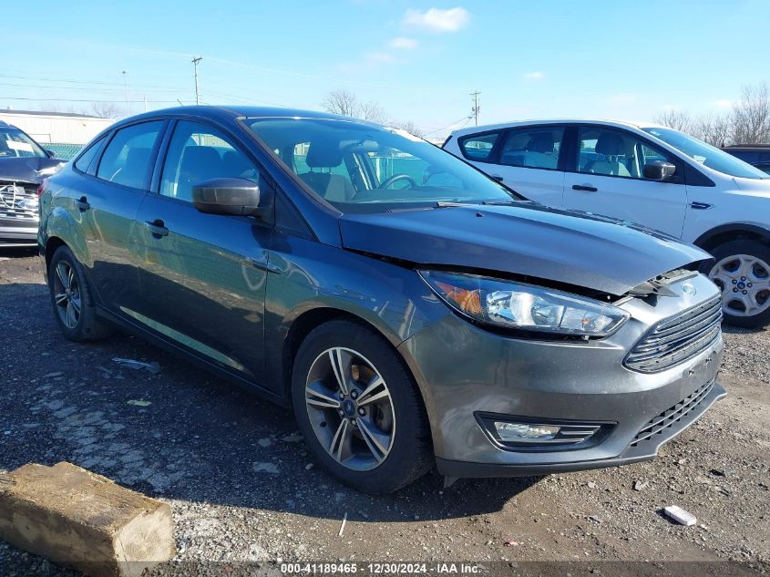 VIN 1FADP3FE3JL235290 2018 Ford Focus, SE no.1