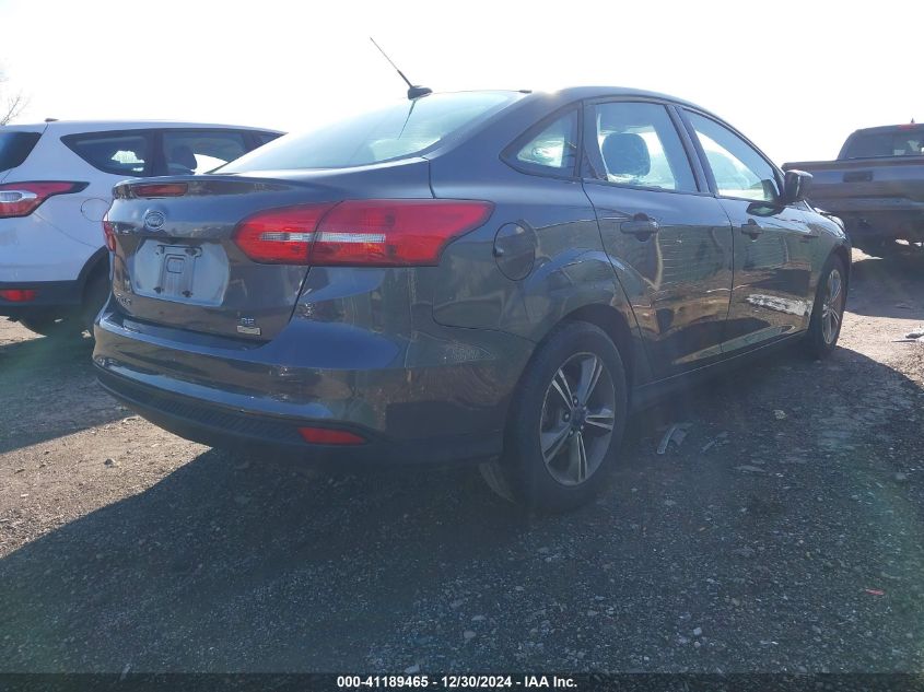 VIN 1FADP3FE3JL235290 2018 Ford Focus, SE no.4