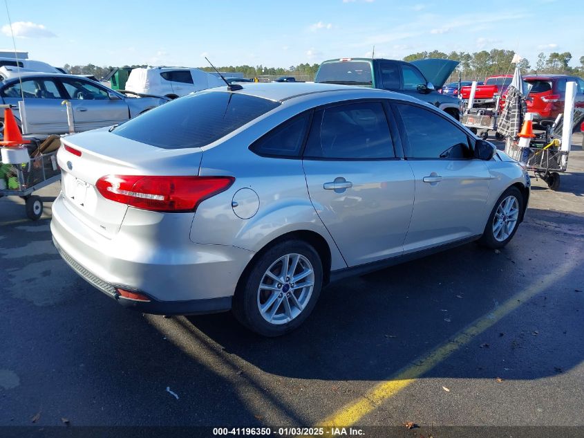 VIN 1FADP3F24HL220264 2017 Ford Focus, SE no.4