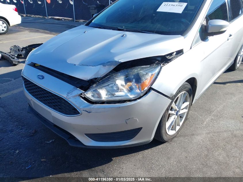 VIN 1FADP3F24HL220264 2017 Ford Focus, SE no.6