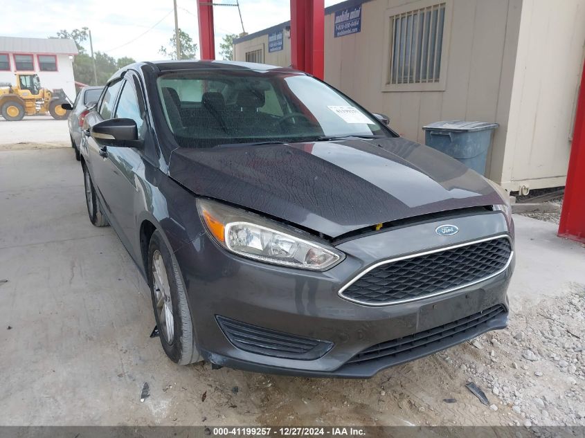 VIN 1FADP3F23HL312935 2017 Ford Focus, SE no.1