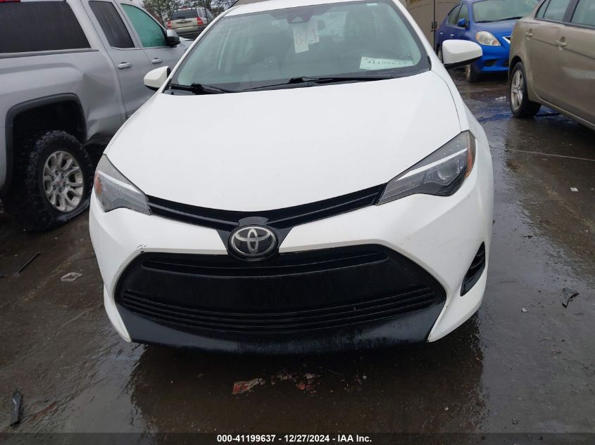 VIN 5YFBURHE3HP733307 2017 Toyota Corolla, LE no.12