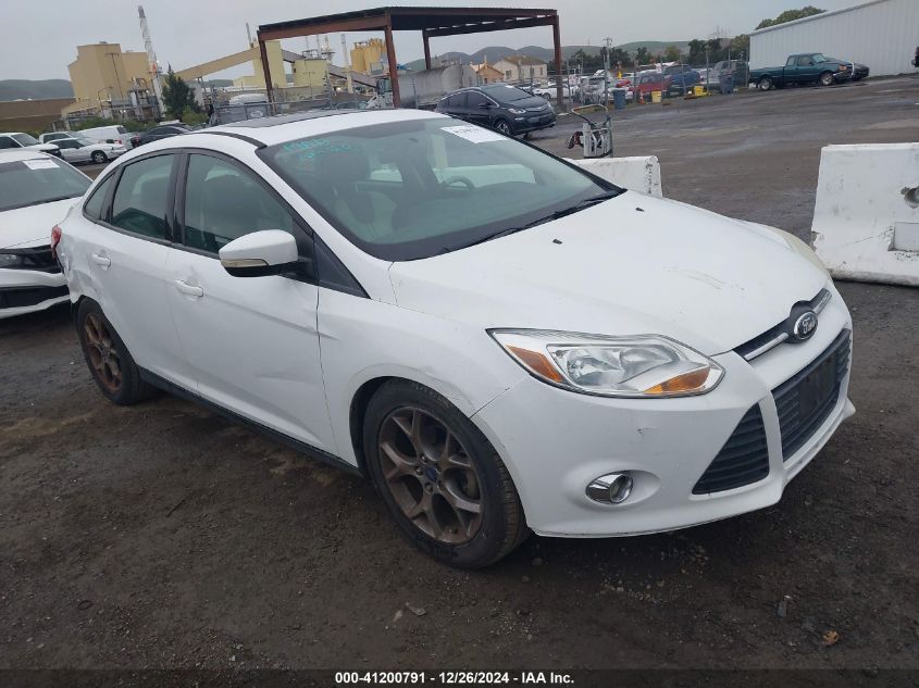 VIN 1FADP3F21EL237504 2014 FORD FOCUS no.1