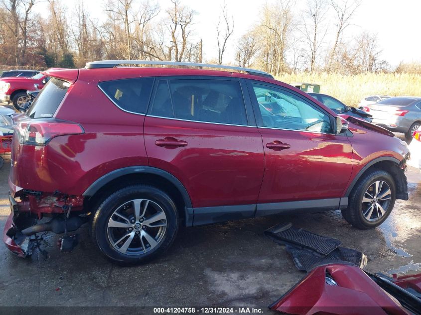 VIN 2T3RFREV2JW731055 2018 TOYOTA RAV4 no.14