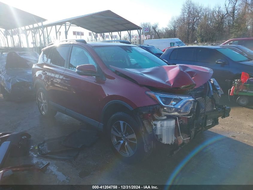 VIN 2T3RFREV2JW731055 2018 TOYOTA RAV4 no.1