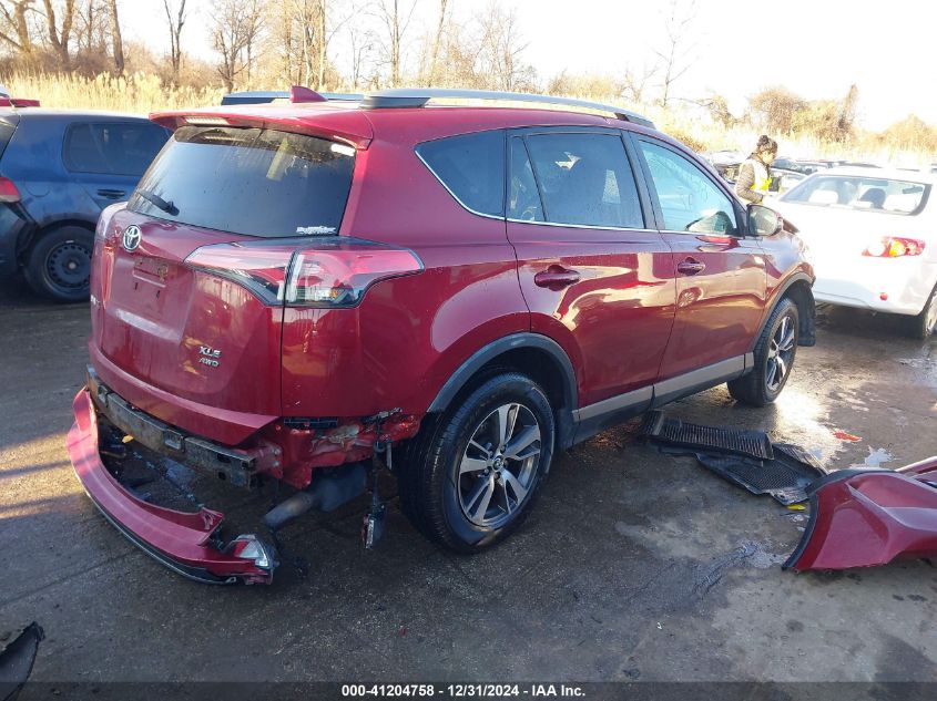 VIN 2T3RFREV2JW731055 2018 TOYOTA RAV4 no.4