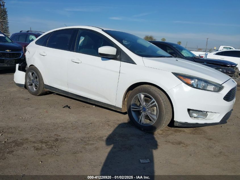 VIN 1FADP3FE7JL278854 2018 FORD FOCUS no.13