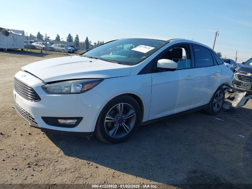 VIN 1FADP3FE7JL278854 2018 FORD FOCUS no.14