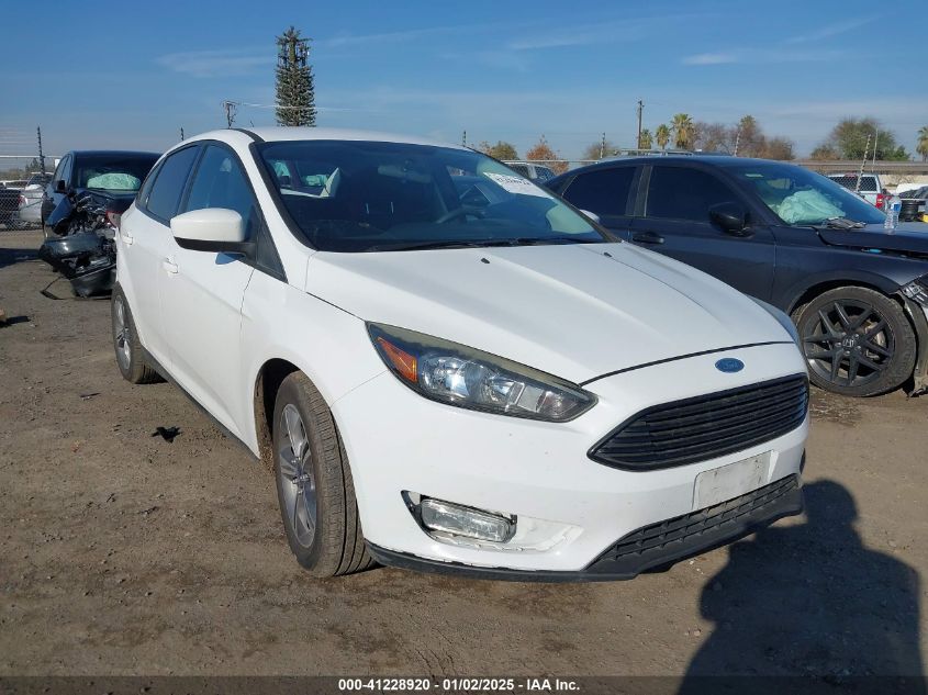 VIN 1FADP3FE7JL278854 2018 FORD FOCUS no.1