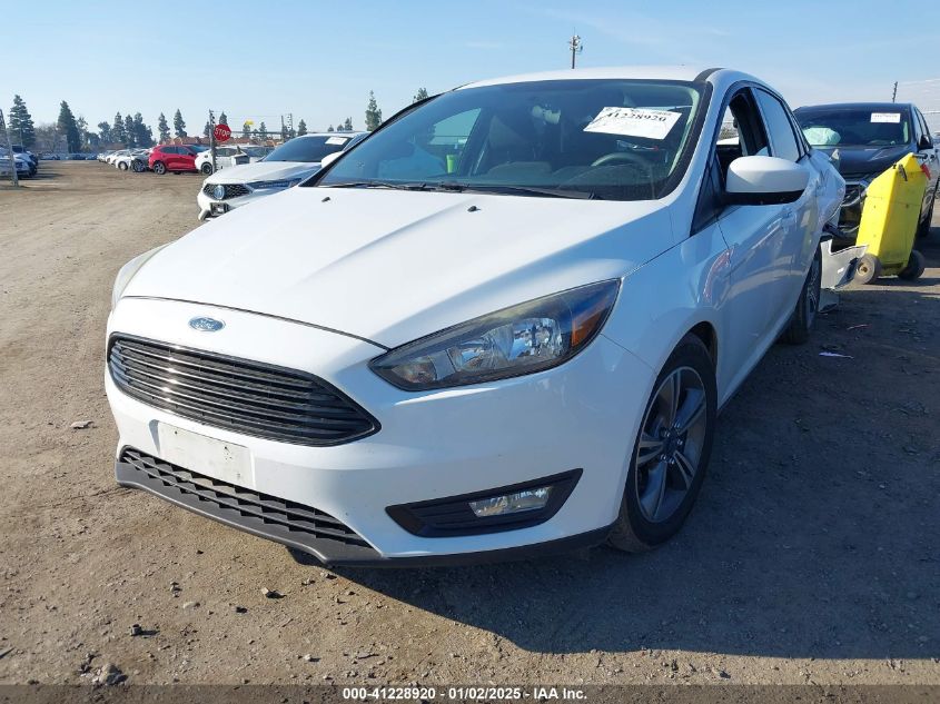 VIN 1FADP3FE7JL278854 2018 FORD FOCUS no.2