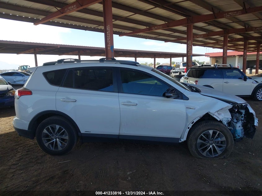 2018 TOYOTA RAV4 HYBRID XLE - JTMRJREV1JD169130