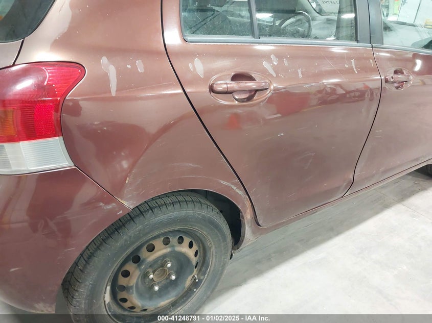 2009 TOYOTA YARIS VIN: JTDKT903195236459