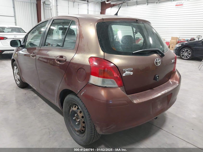 2009 TOYOTA YARIS VIN: JTDKT903195236459