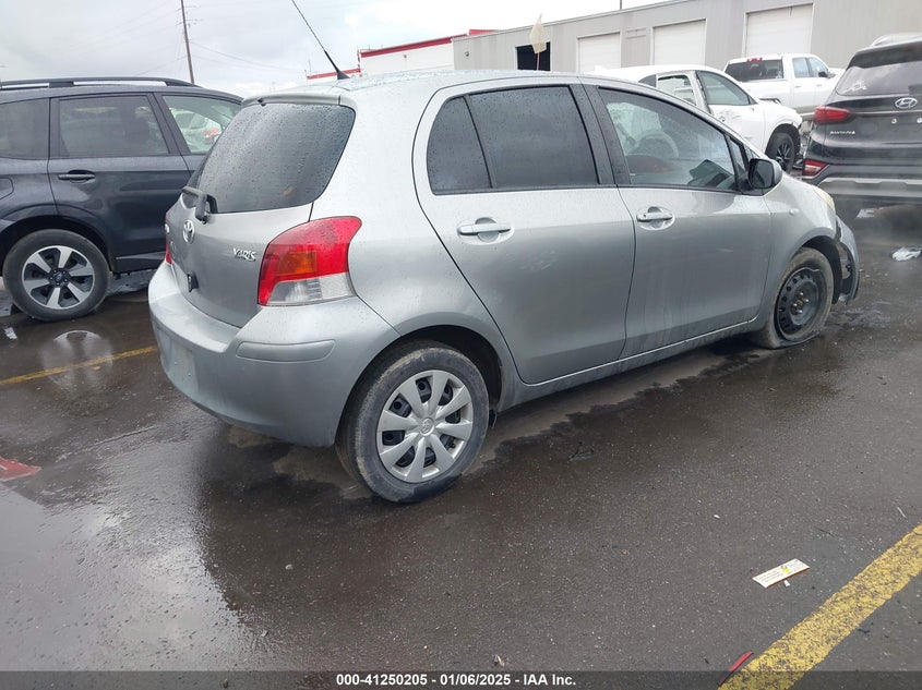2009 TOYOTA YARIS VIN: JTDKT903195231410