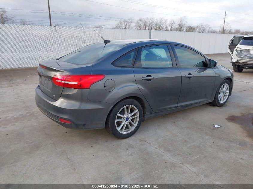 VIN 1FADP3F24JL259152 2018 Ford Focus, SE no.4