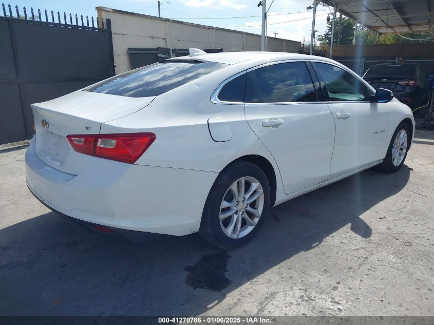 VIN 1G1ZD5ST9JF244558 2018 Chevrolet Malibu, LT no.4