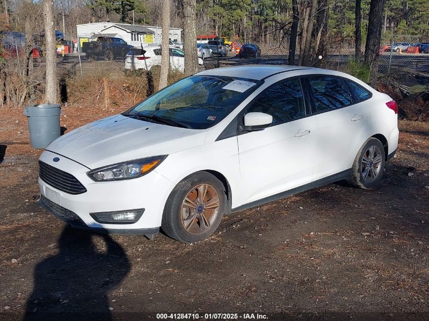 VIN 1FADP3FE3JL219784 2018 FORD FOCUS no.2