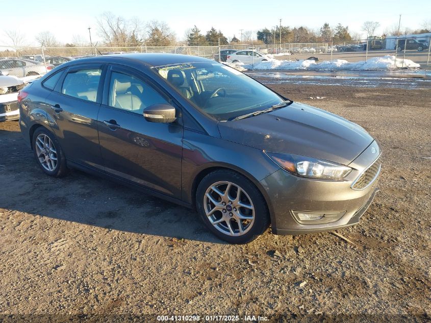 VIN 1FADP3F2XFL319328 2015 FORD FOCUS no.1