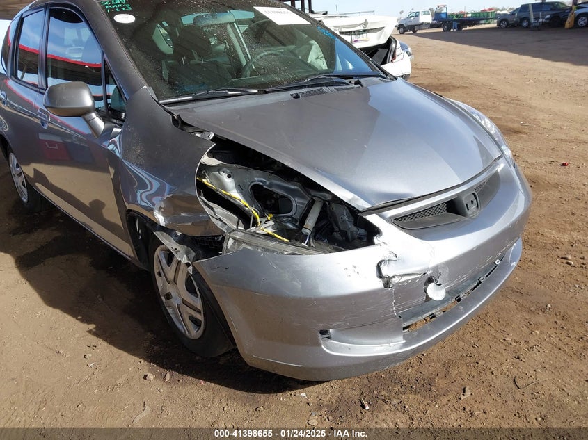 2007 HONDA FIT VIN: JHMGD37477S026170