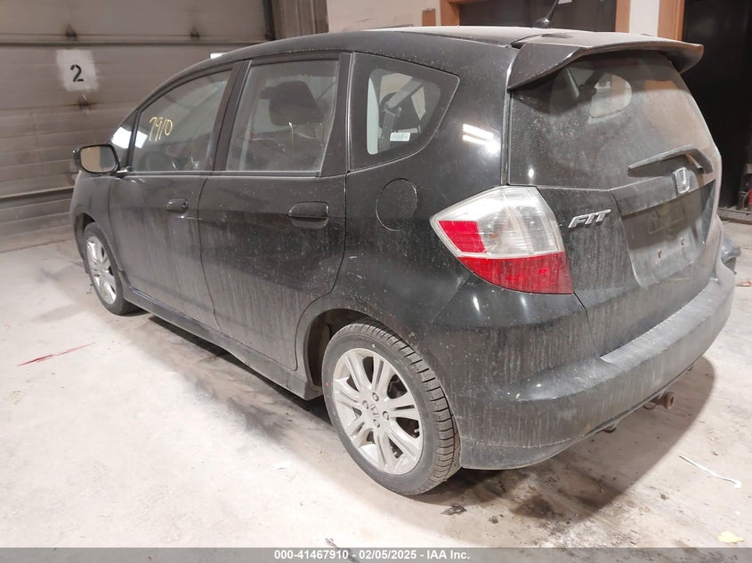 2009 HONDA FIT VIN: JHMGE874X9C002923